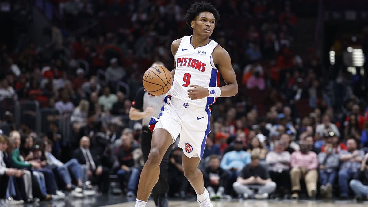 Detroit Pistons forward Ausar Thompson (9) brings the ball up court against the Chicago Bulls during the first half at United Center. 