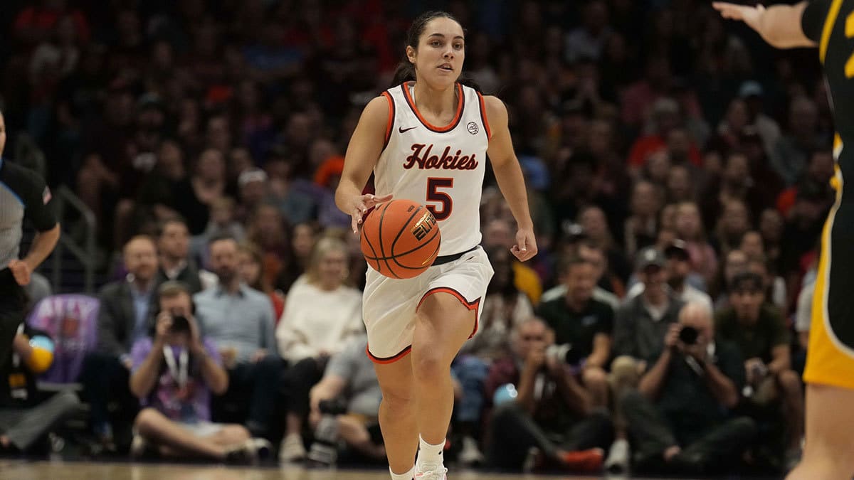 Virginia Tech Hokies guard Georgia Amoore (5) brings the ball up court during the first half against the Iowa Hawkeyes.
