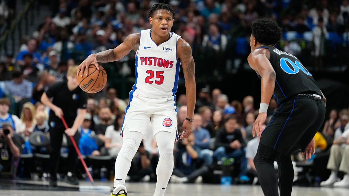 Detroit Pistons guard Marcus Sasser (25) controls the ball as Dallas Mavericks guard Brandon Williams (00) defends during the second half at American Airlines Center.
