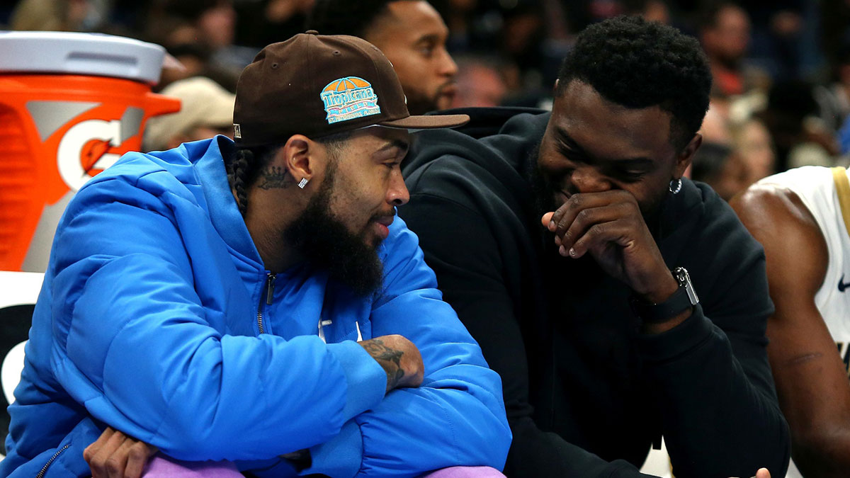New Orleans Pelicans forward Zion Williamson (right) talks with forward Brandon Ingram (left) on the bench during the second half against the Memphis Grizzlies at FedExForum.