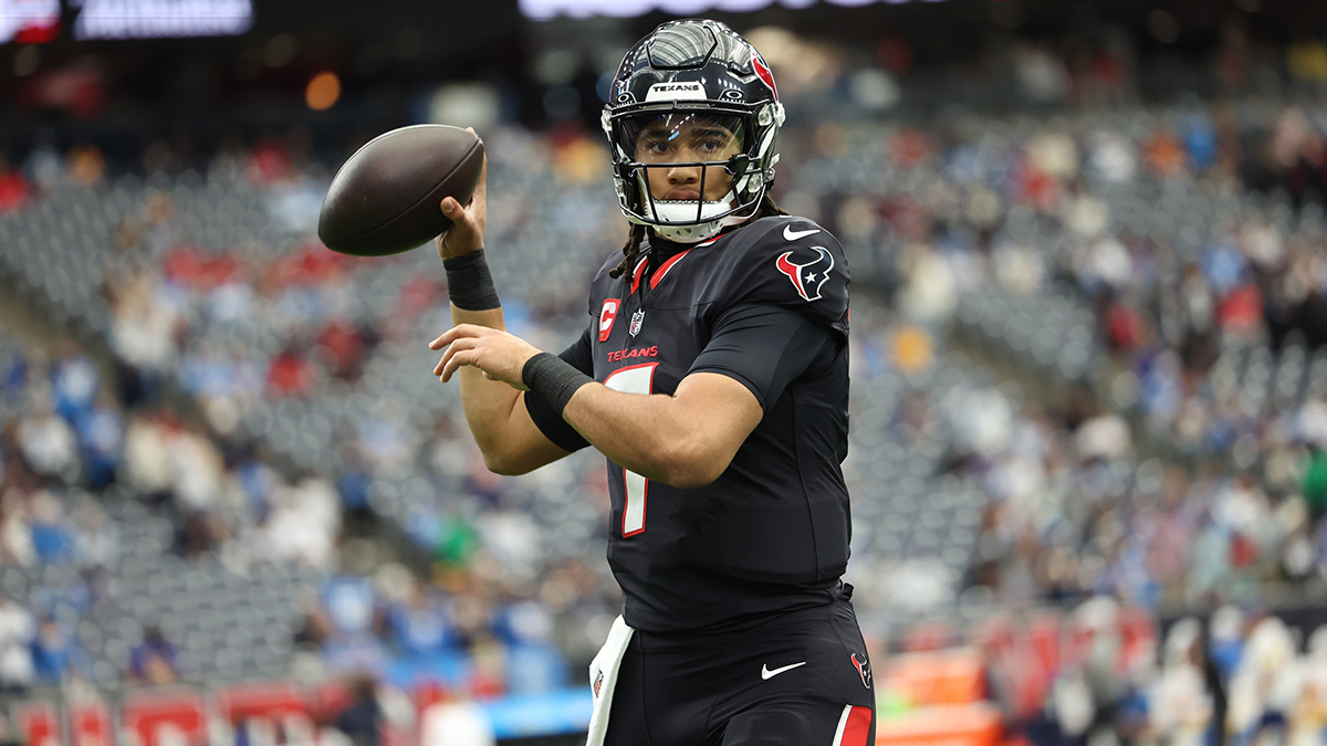 Jan 11, 2025; Houston, Texas, USA; Houston Texans quarterback C.J. Stroud (7) warms up prior to the game against the Los Angeles Chargers in an AFC wild card game at NRG Stadium.