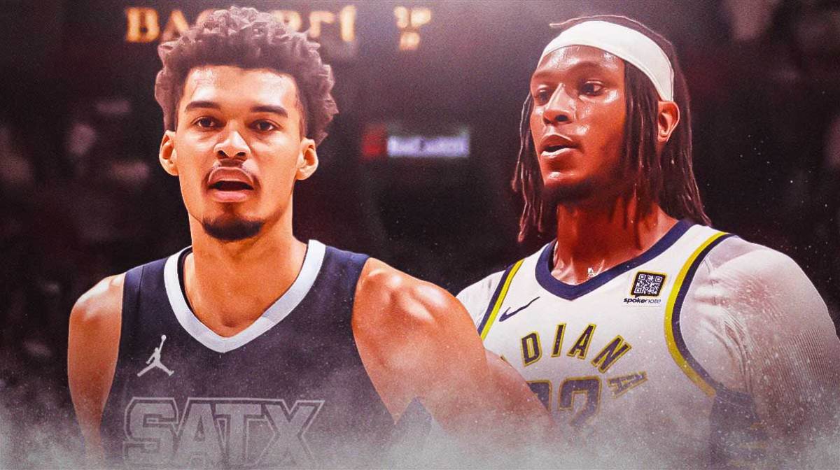 Myles Turner beside Victor Wembanyama.