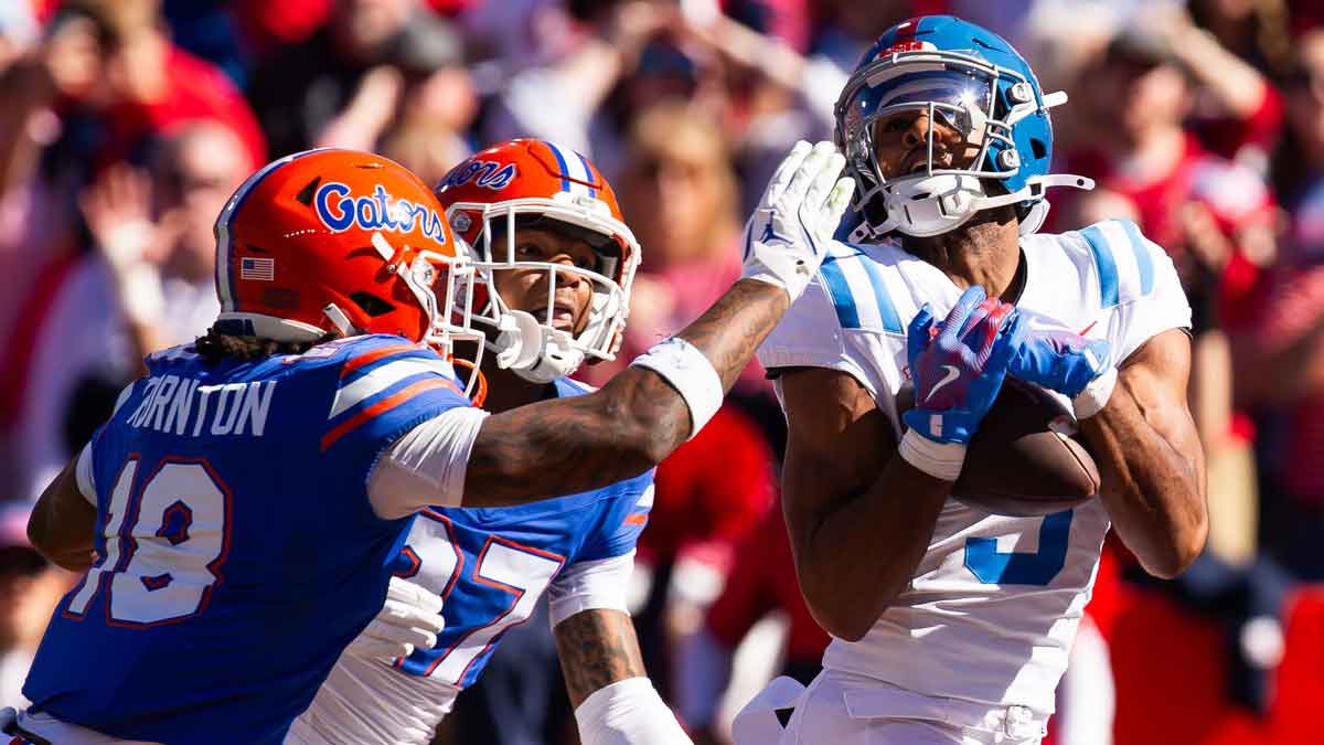 Mississippi Rebels wide receiver Tre Harris (9) hauls in a touchdown pass during the first half at Ben Hill Griffin Stadium in Gainesville, FL on Saturday, November 23, 2024. [Doug Engle/Gainesville Sun]