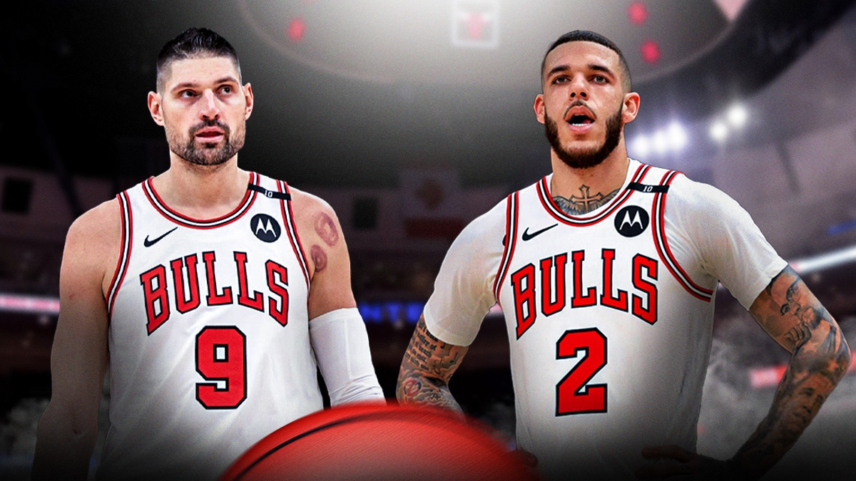 Lonzo Bell next to Nikola Vucevic in front of the Bulls court.