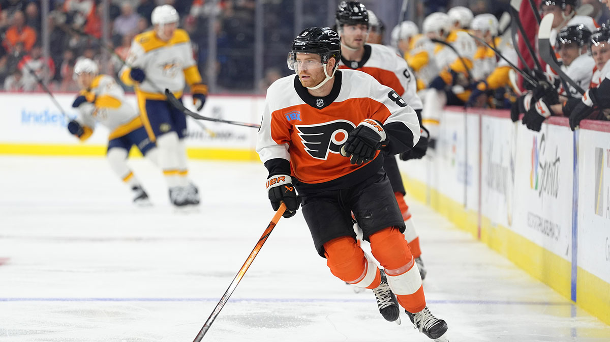 Philadelphia Flyers defenseman Cam York (8) chases the puck against the Nashville Predators in the first period at Wells Fargo Center
