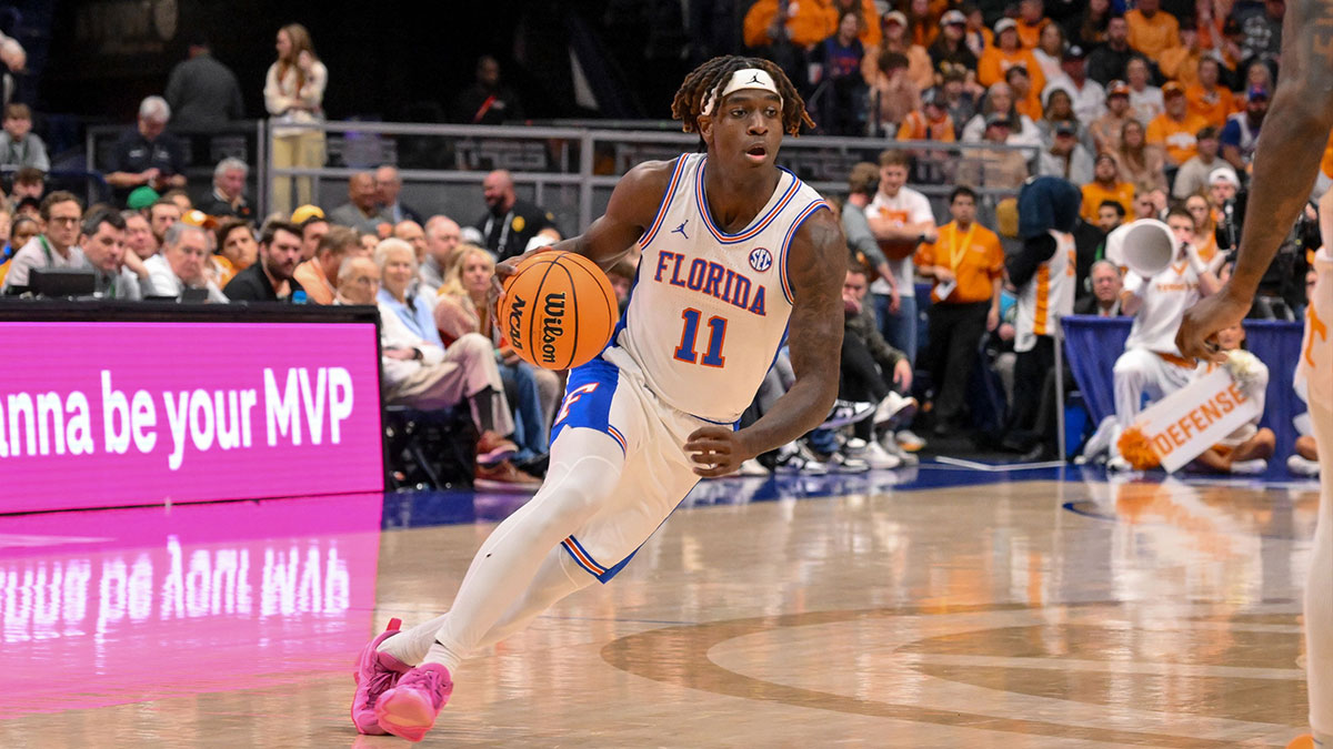 Florida Gators guard Denzel Aberdeen (11), now of Kentucky, drives to the basket against the Tennessee Volunteers during the second half at the 2025 SEC Championship Game at Bridgestone Arena.