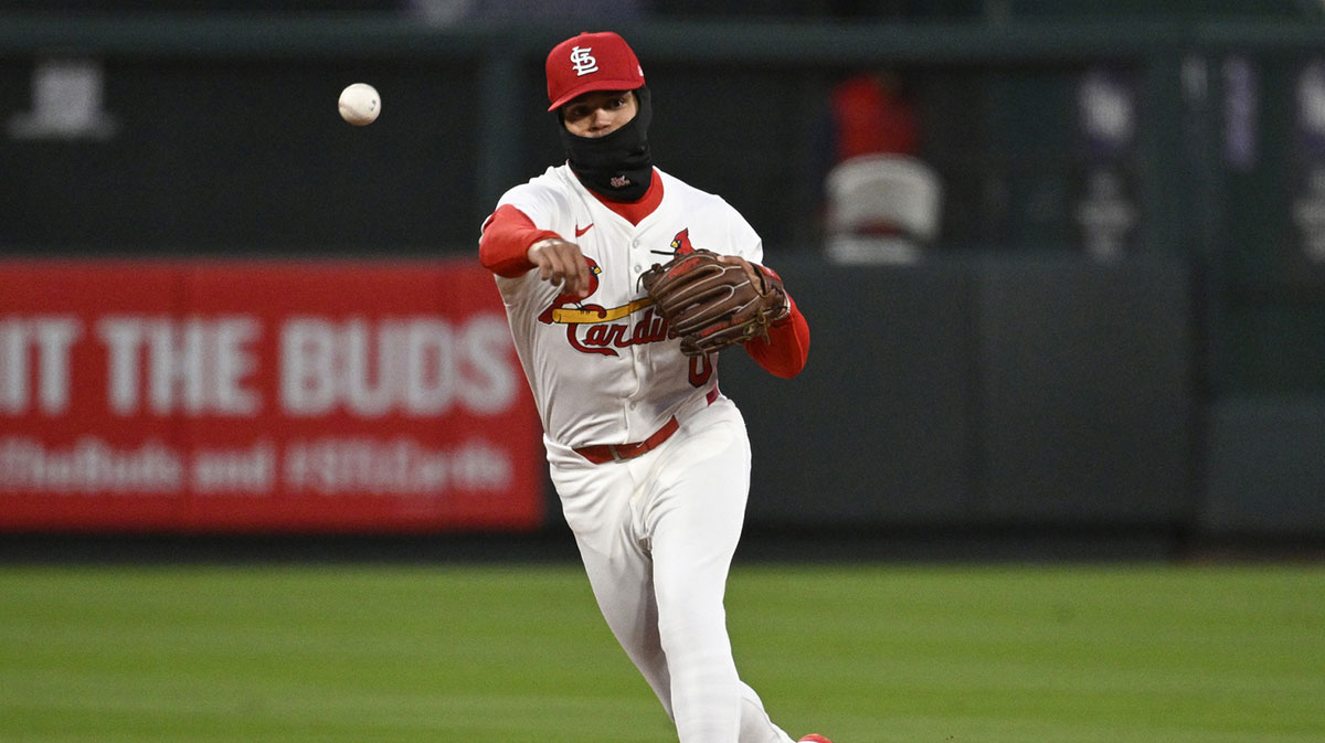 Mar 31, 2025; St. Louis, Missouri, USA; St. Louis Cardinals shortstop Masyn Winn (0) throws to first for an out against the Los Angeles Angels in the third inning at Busch Stadium.