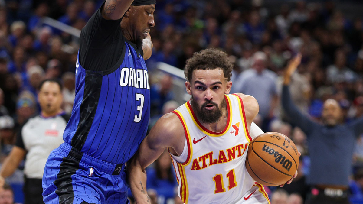 Atlanta Hawks guard Trae Young (11) controls the ball against the Orlando Magic in the second quarter at Kia Center.