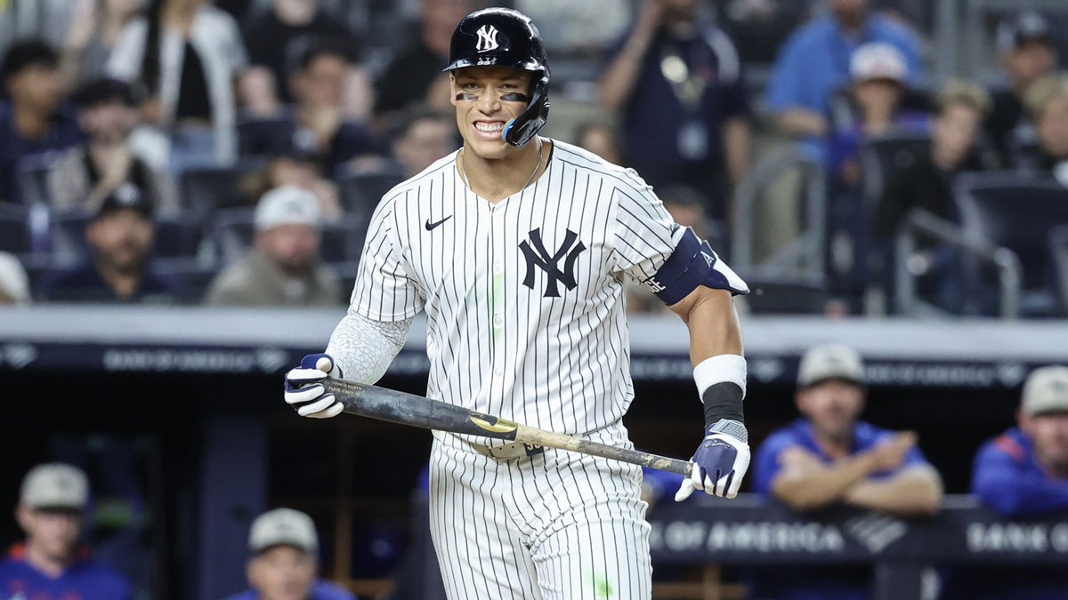 New York Yankees right fielder Aaron Judge (99) reacts after striking out with the bases loaded in the eighth inning against the New York Mets at Yankee Stadium.