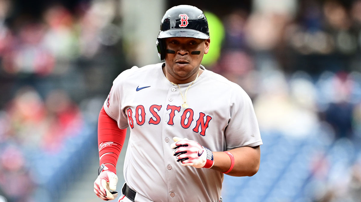 Boston Red Sox designated hitter Rafael Devers (11) rounds the bases after hitting a home run during the third inning against the Cleveland Guardians at Progressive Field.