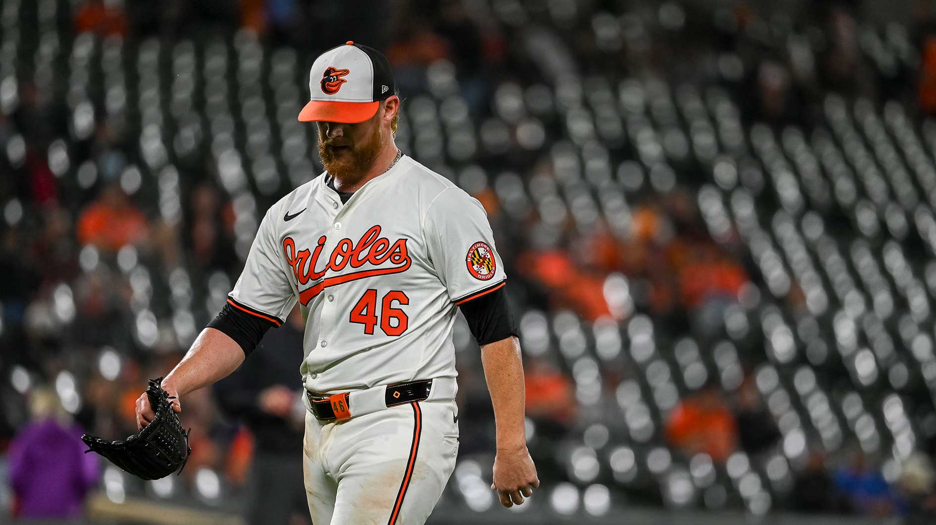 Baltimore Orioles pitcher Craig Kimbrel (46) walks off the field after being removed during the ninth inning against the San Francisco Giants at Oriole Park at Camden Yards.