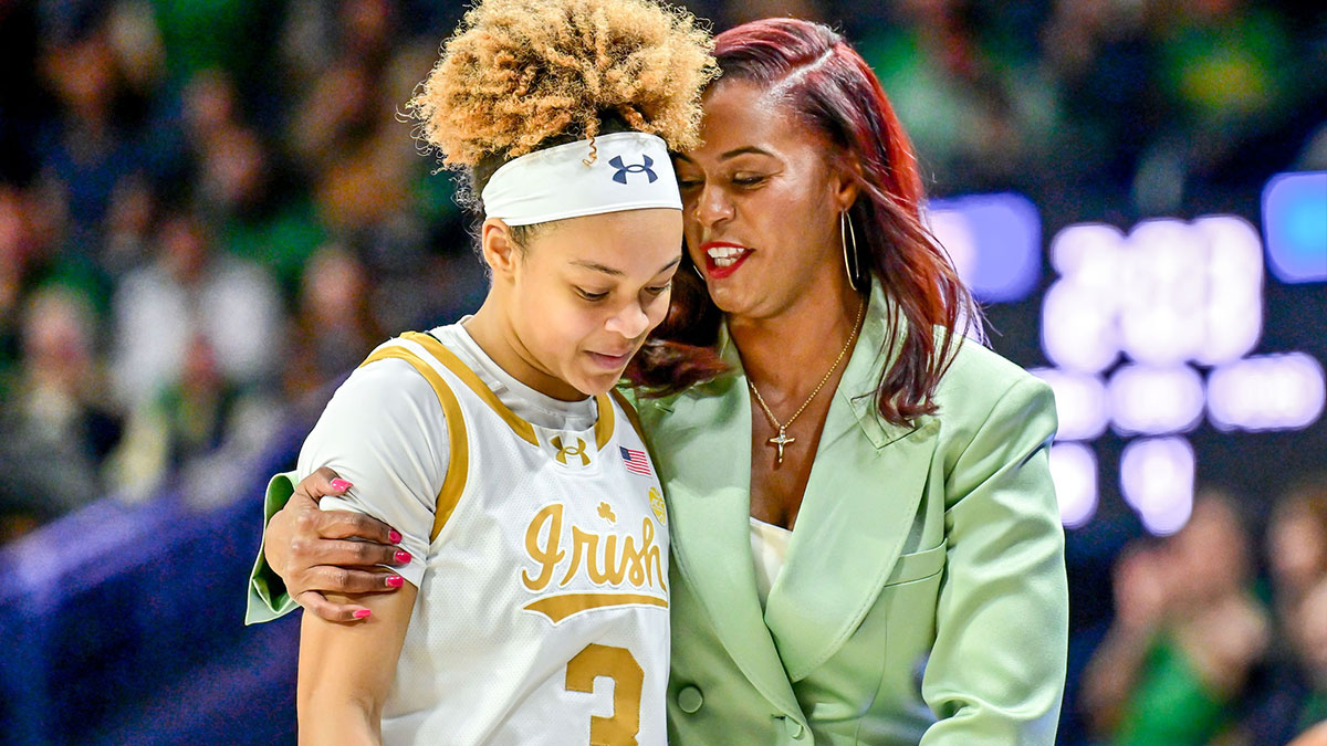 Notre Dame Fighting Irish head coach Niele Ivey talks to guard Hannah Hidalgo (3) in the second half against the Duke Blue Devils at the Purcell Pavilion.