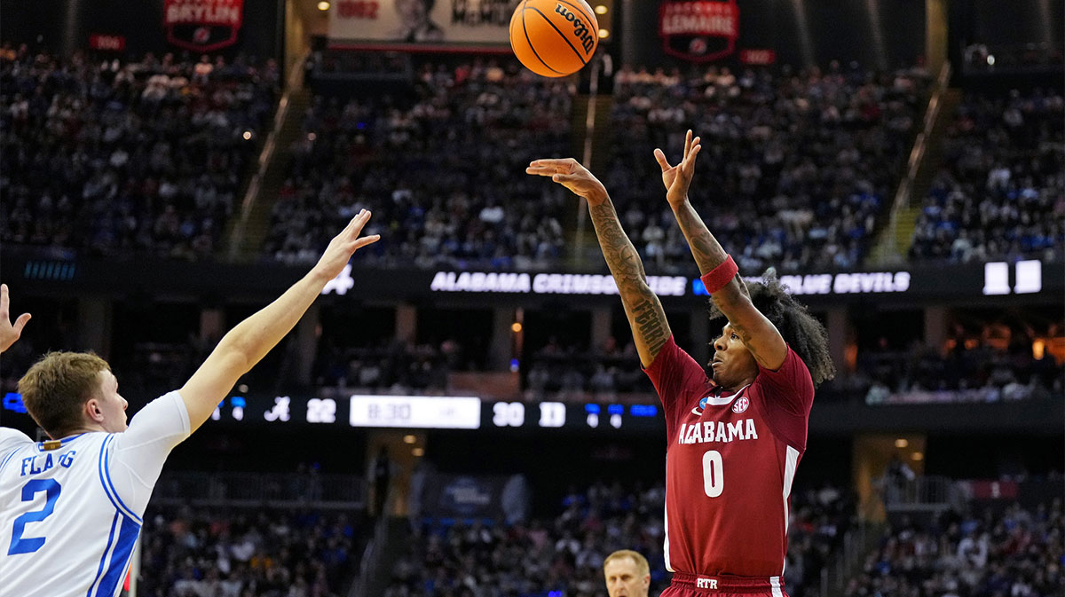 Alabama Crimson Tide guard Labaron Philon (0) shoots the ball against Duke Blue Devils forward Cooper Flagg (2) in the East Regional final of the 2025 NCAA tournament at Prudential Center.