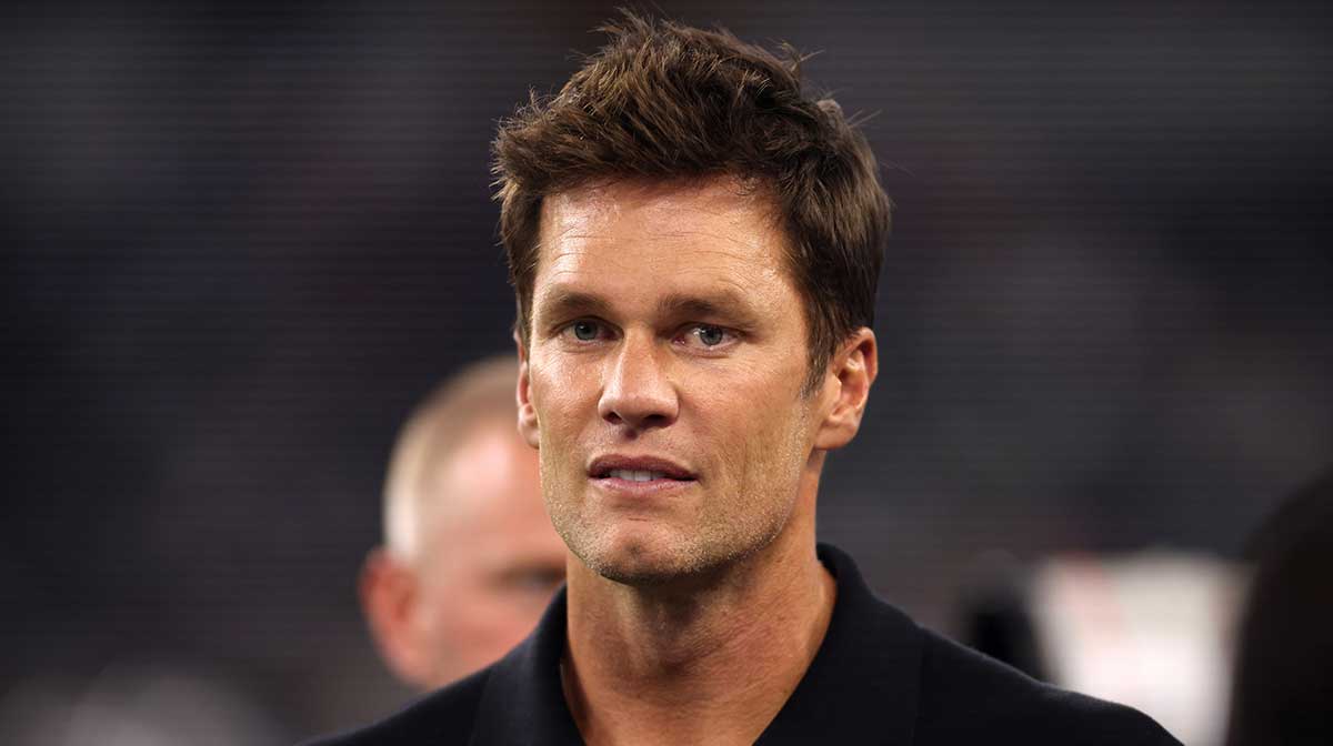 Former NFL player Tom Brady on the field before the game between the Dallas Cowboys and the Las Vegas Raiders at AT&T Stadium.