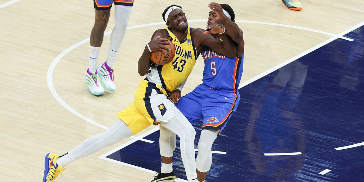 Indiana Pacers forward Pascal Siakam (43) drives to the basket defended by Oklahoma City Thunder guard Luguentz Dort (5) in the first quarter during game six of the 2025 NBA Finals at Gainbridge Fieldhouse.