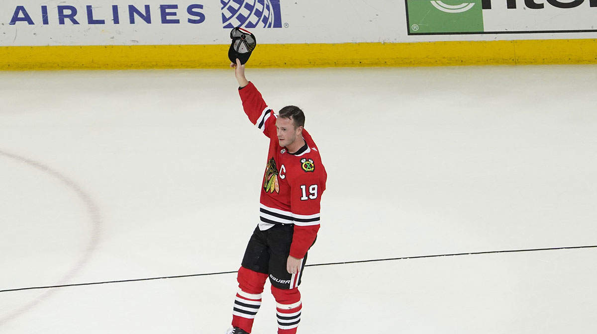 Chicago Blackhawks center Jonathan Toews (19) is honored after the game against the Philadelphia Flyers. He played his last game as a Blackhawk, at United Center.