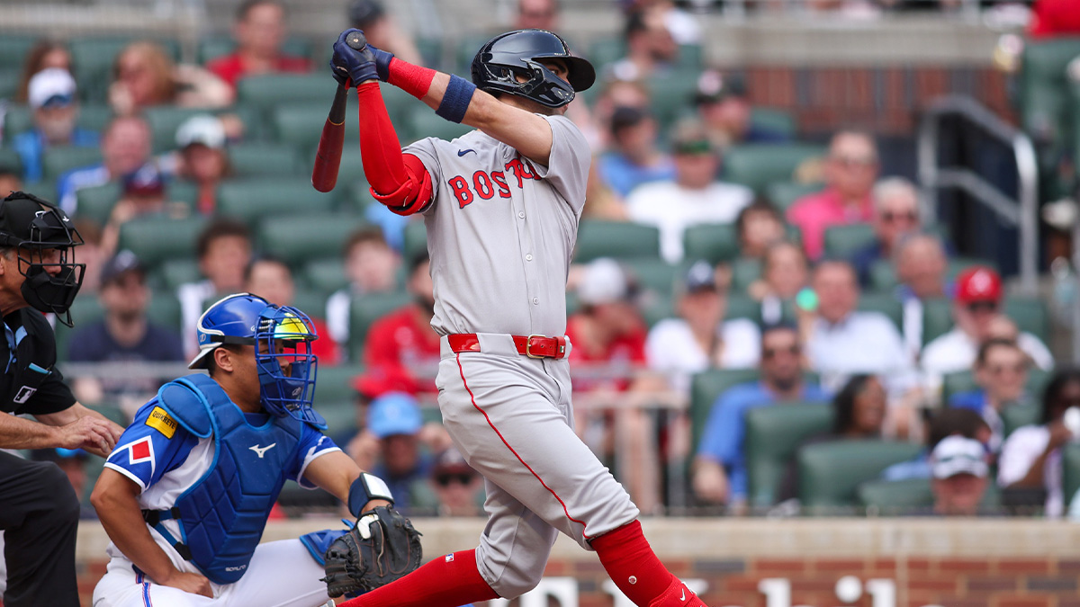 Boston Red Sox shortstop Marcelo Mayer (39) hits a single against the Atlanta Braves in the seventh inning at Truist Park.