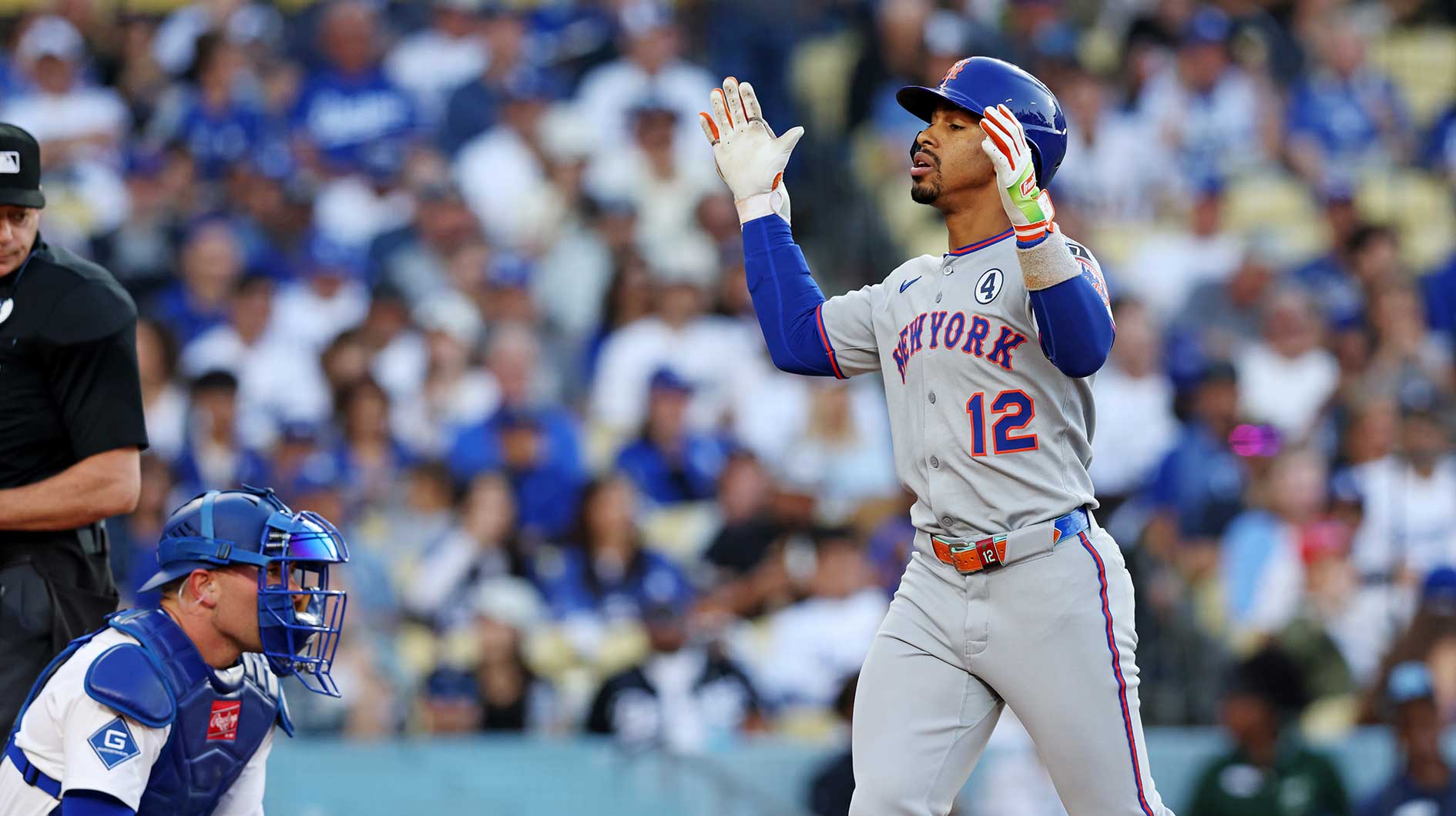 New York Mets shortstop Francisco Lindor (12) rounds the bases during the first inning against the Los Angeles Dodgers during the first inning against the New York Mets at Dodger Stadium.