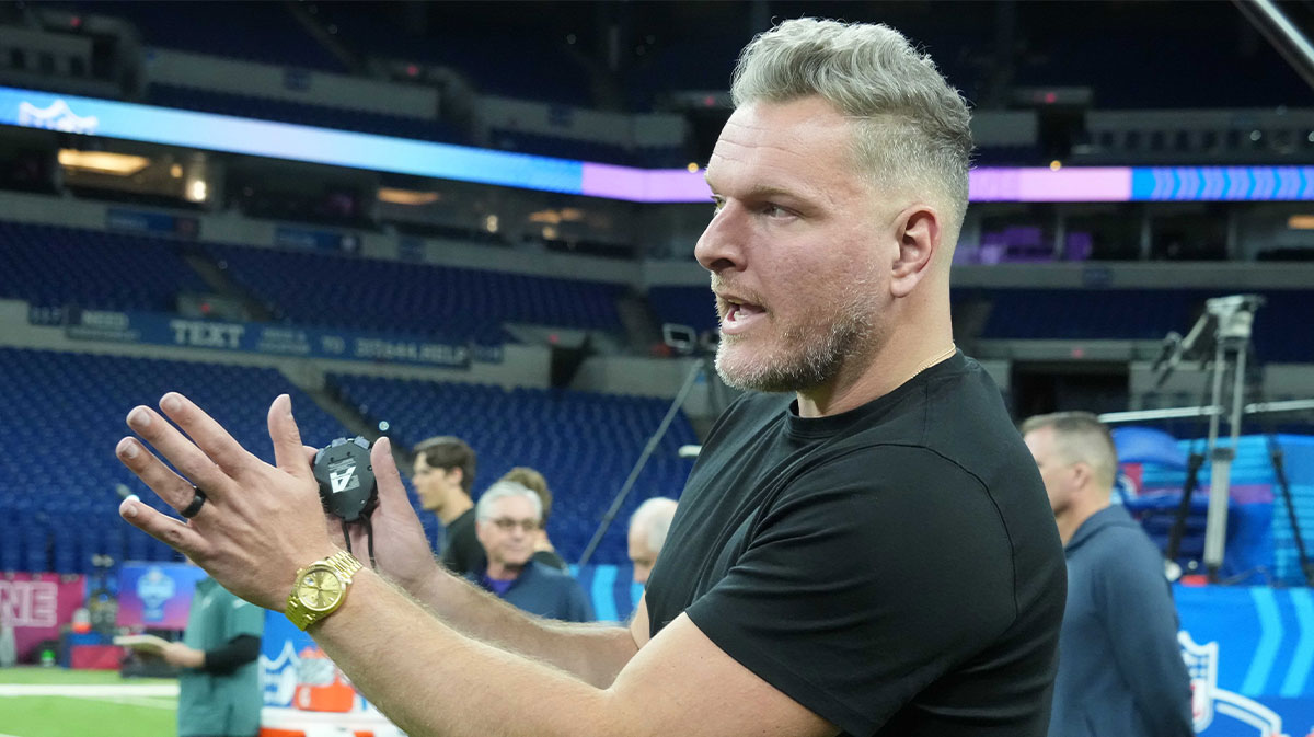 Pat McAfee watches workouts at the 2025 NFL Scouting Combine at Lucas Oil Stadium. 