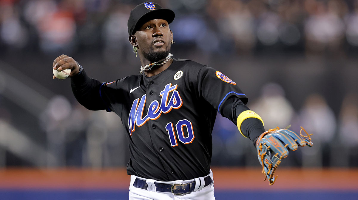 New York Mets third baseman Ronny Mauricio (10) throws a ball into the stands after the top of the first inning against the Cincinnati Reds at Citi Field.