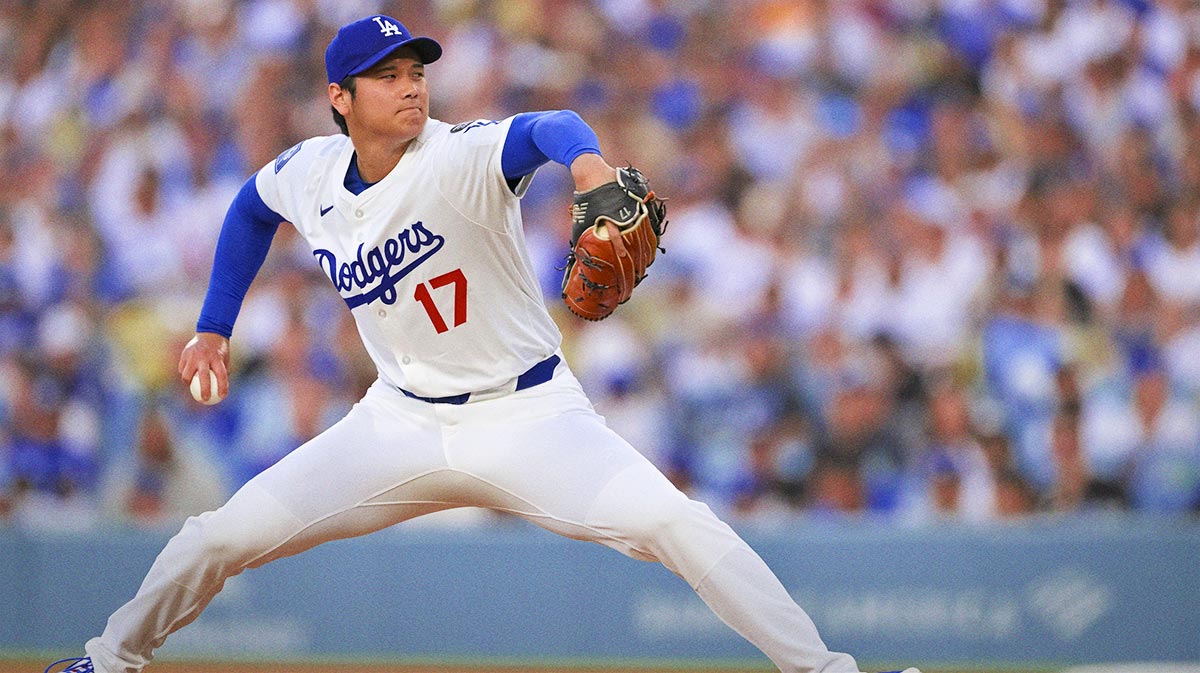 Los Angeles Dodgers designated hitter Shohei Ohtani (17) throws against the San Diego Padres during the first inning at Dodger Stadium.