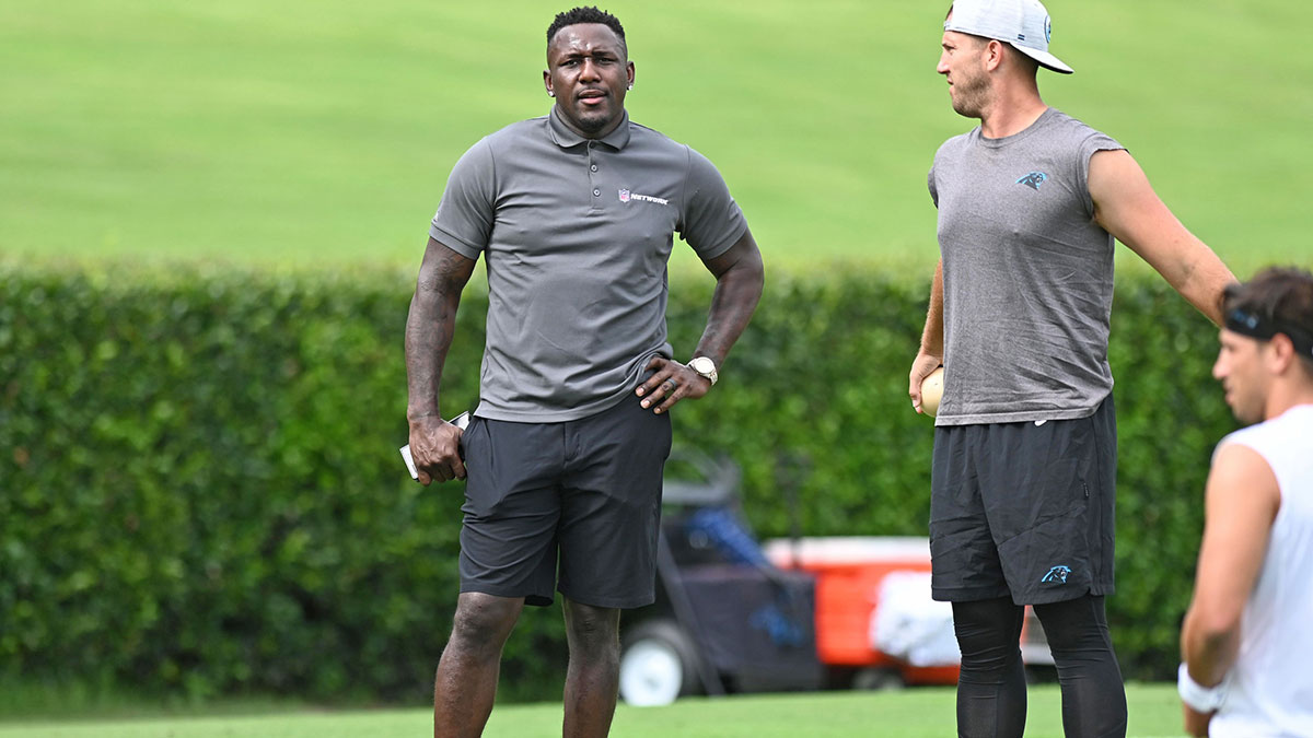 Former Carolina Panthers linebacker Thomas Davis (58) alongside long snapper JJ Jansen (44) before training camp at Wofford College.