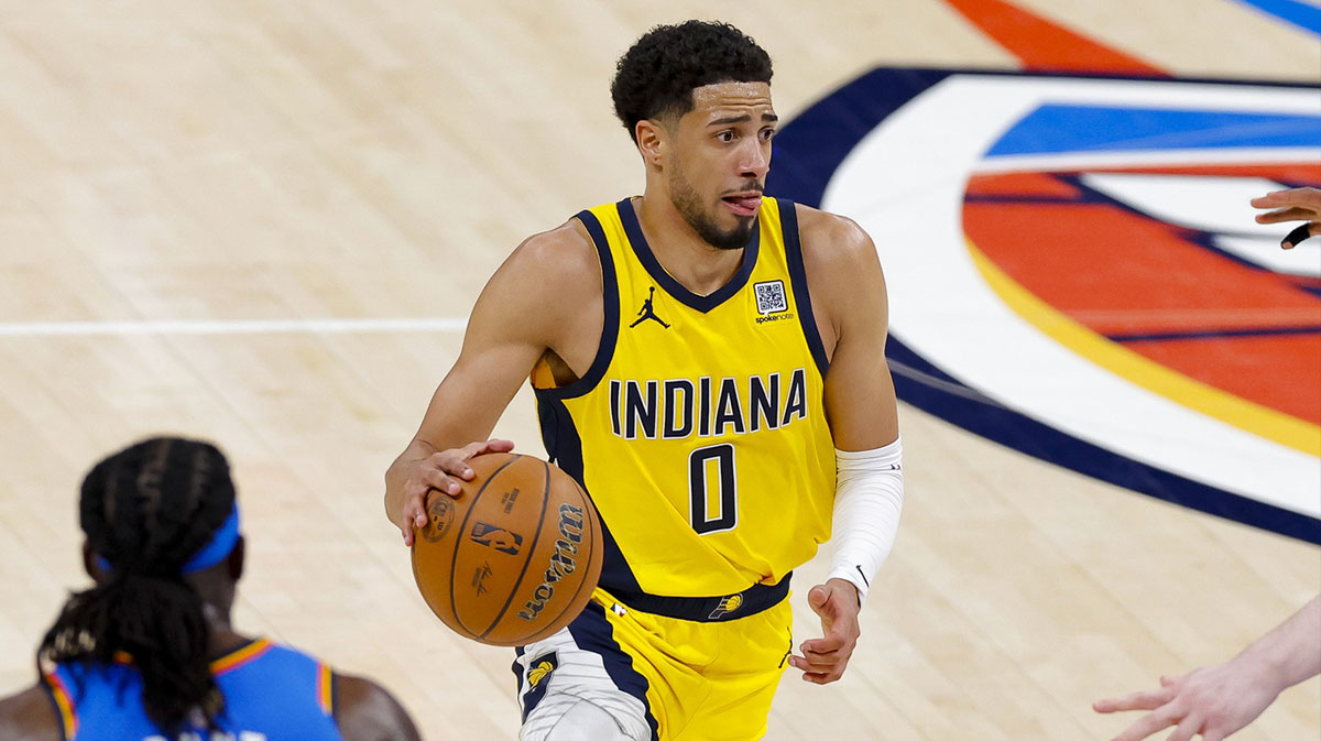 Indiana Pacers guard Tyrese Haliburton (0) brings the ball up court against the Oklahoma City Thunder during the third quarter of game two of the 2025 NBA Finals at Paycom Center.