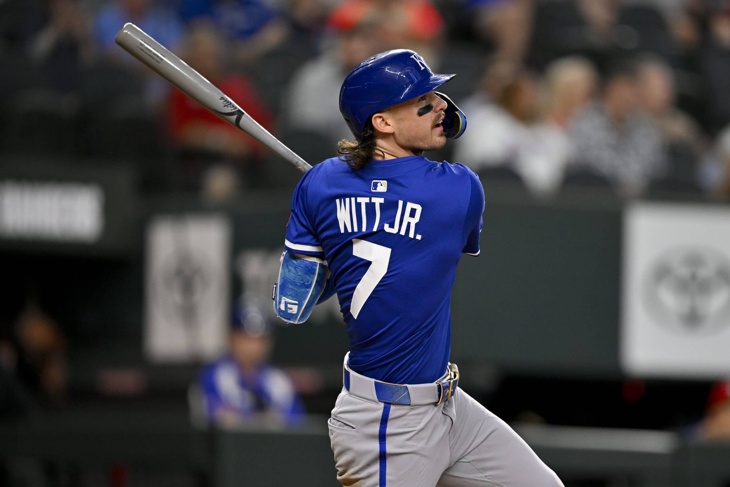 Jun 19, 2025; Arlington, Texas, USA; Kansas City Royals shortstop Bobby Witt Jr. (7) hits a double against the Texas Rangers during the game at Globe Life Field. Mandatory Credit: Jerome Miron-Imagn Images