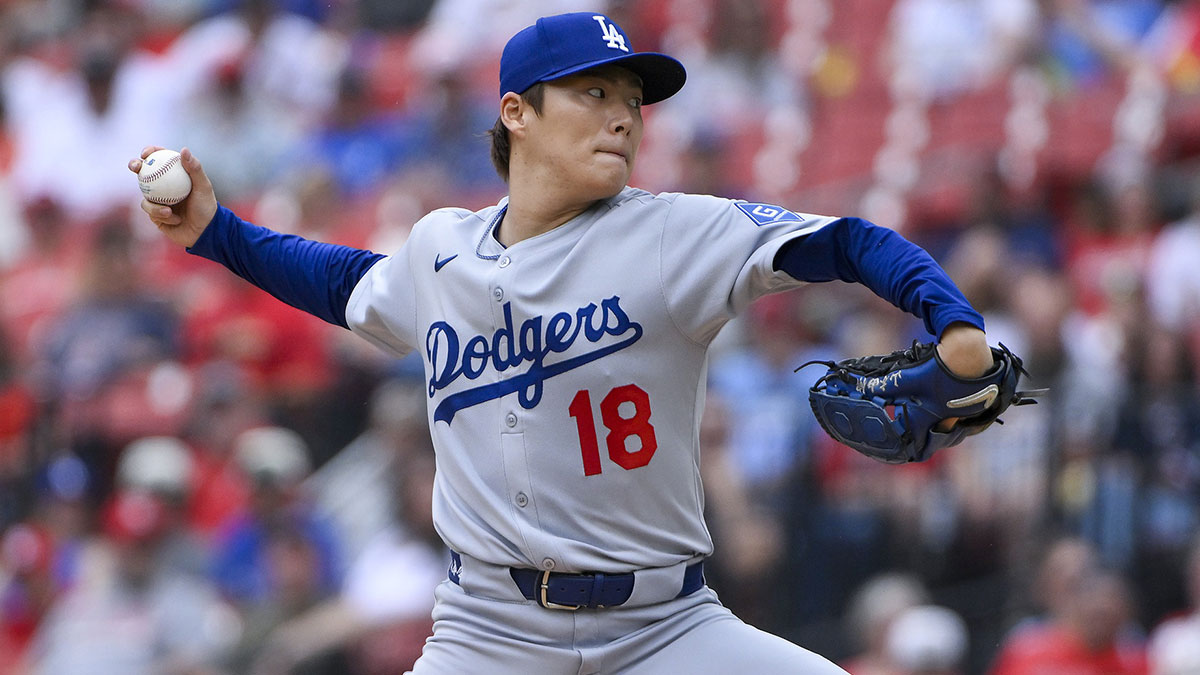 Los Angeles Dodgers starting pitcher Yoshinobu Yamamoto (18) pitches against the St. Louis Cardinals during the first inning at Busch Stadium. Mandatory Credit: Jeff Curry-Imagn Images